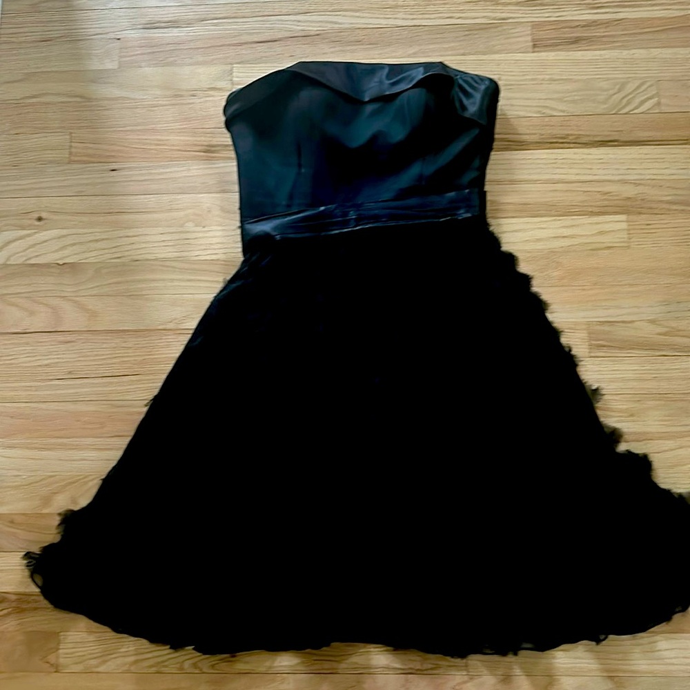She a real cute LBD for my midi size girls. Size 14
